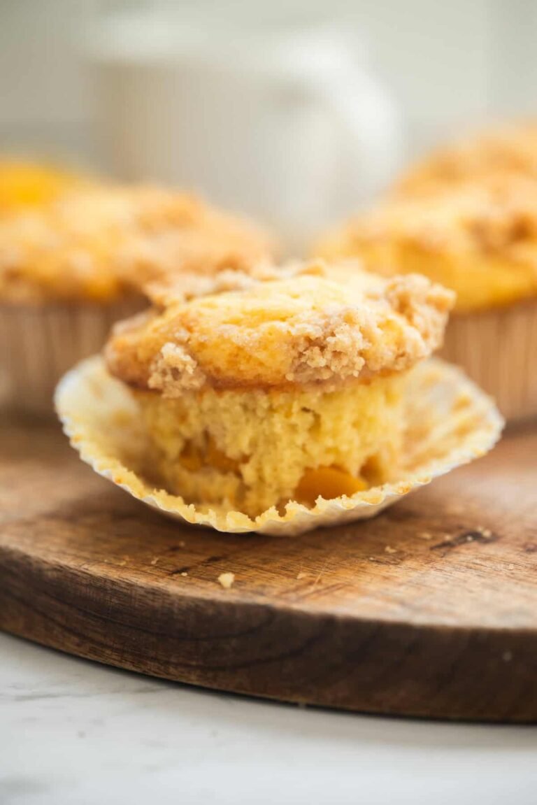 Sourdough peach muffins with streusel crumbs
